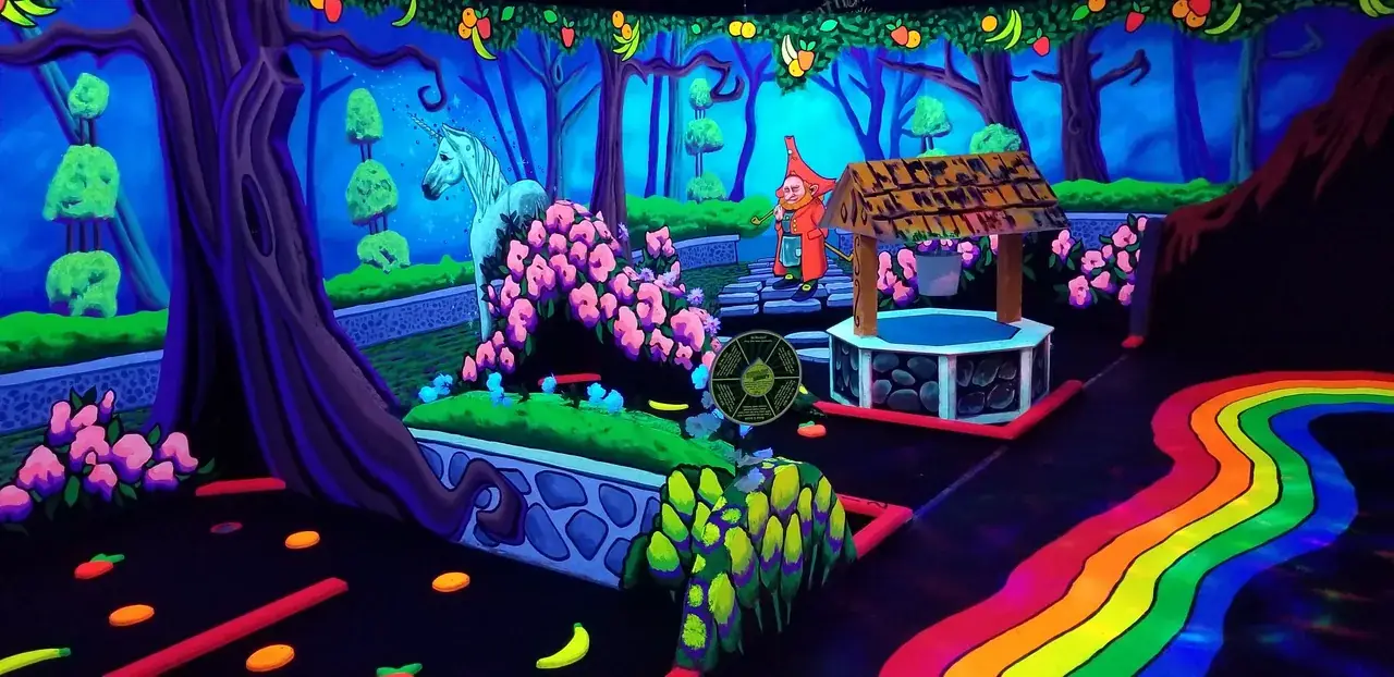 Unicorn, rainbow path, and enchanted forest world at Imagine 3D Mini Golf