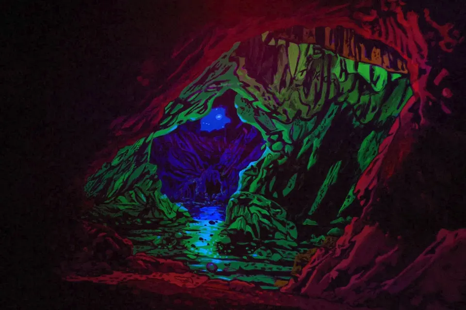 Hand-painted blacklight mural detail at Imagine 3D Mini Golf Gilbert
