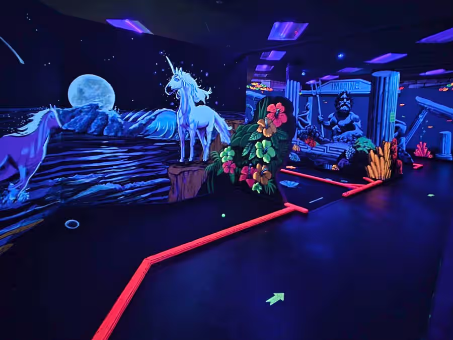 Unicorn and moonlit beach mural hole at Imagine 3D Mini Golf Scottsdale