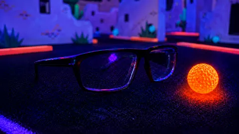 3D glasses on a glowing blacklight mini golf course at Sedona