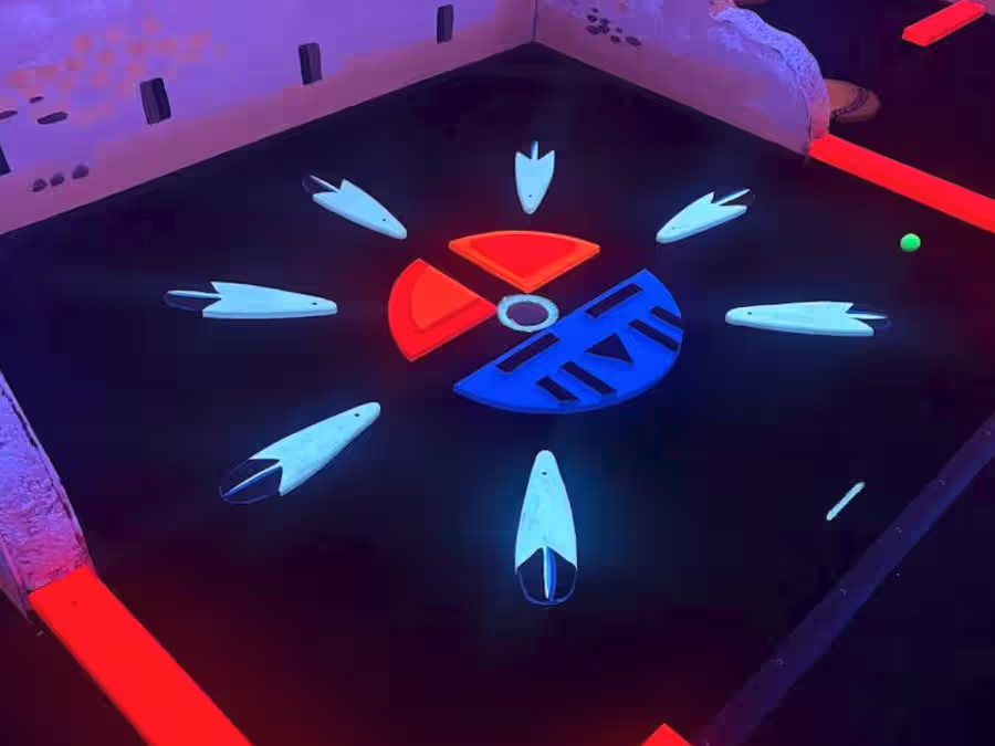 Pueblo ruins mural with glowing sun-symbol hole at Sedona